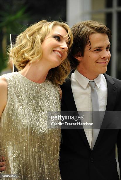 Writer/director Shana Feste and actor Johnny Simmons arrive at the Premiere Of The Creative Coalition's "The Greatest" at the Linwood Dunn Theatre on...