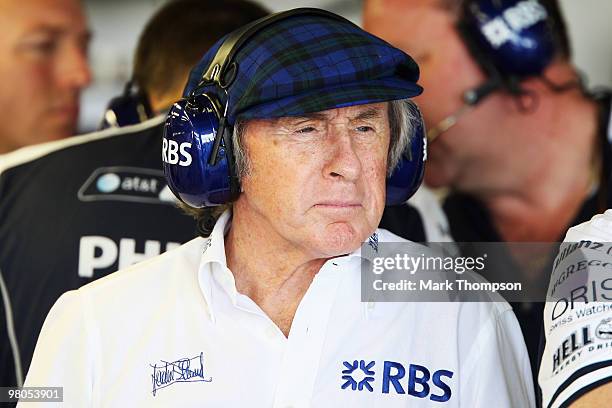 Sir Jackie Stewart is seen in the Williams garage during practice for the Australian Formula One Grand Prix at the Albert Park Circuit on March 26,...