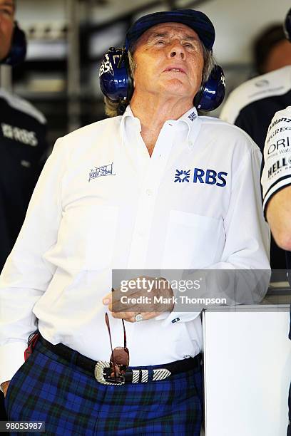 Sir Jackie Stewart is seen in the Williams garage during practice for the Australian Formula One Grand Prix at the Albert Park Circuit on March 26,...
