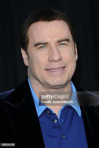 Actor John Travolta arrives at the "The Last Song" Los Angeles premiere held at ArcLight Hollywood on March 25, 2010 in Hollywood, California.