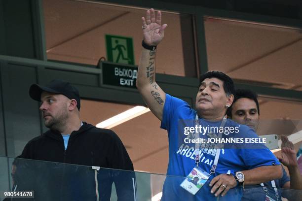 Argentina's football legend Diego Maradona gestures in the grandstand before the Russia 2018 World Cup Group D football match between Argentina and...
