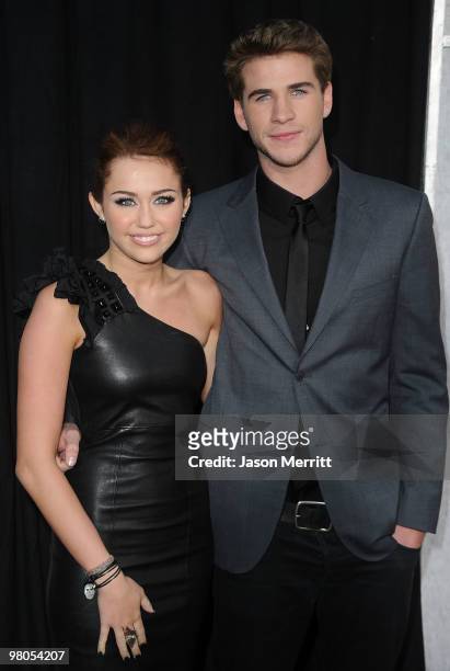 Actress/singer Miley Cyrus and actor Liam Hemsworth arrive at the "The Last Song" Los Angeles premiere held at ArcLight Hollywood on March 25, 2010...