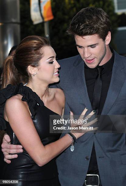 Actress/singer Miley Cyrus and actor Liam Hemsworth arrive at the "The Last Song" Los Angeles premiere held at ArcLight Hollywood on March 25, 2010...