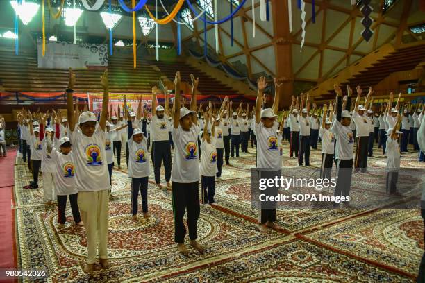 Children practicing Yoga in the presence of Govenor Of Jammu and Kashmir N.N. Vohra on the international day for Yoga in Indore stadium Srinagar...