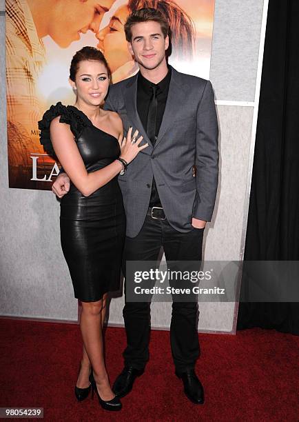 Miley Cyrus and Liam Hemsworth attends the "The Last Song" Los Angeles Premiere at ArcLight Hollywood on March 25, 2010 in Hollywood, California.