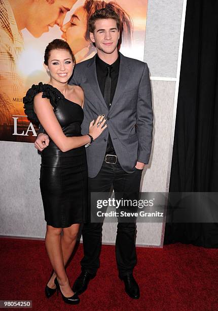 Miley Cyrus and Liam Hemsworth attends the "The Last Song" Los Angeles Premiere at ArcLight Hollywood on March 25, 2010 in Hollywood, California.