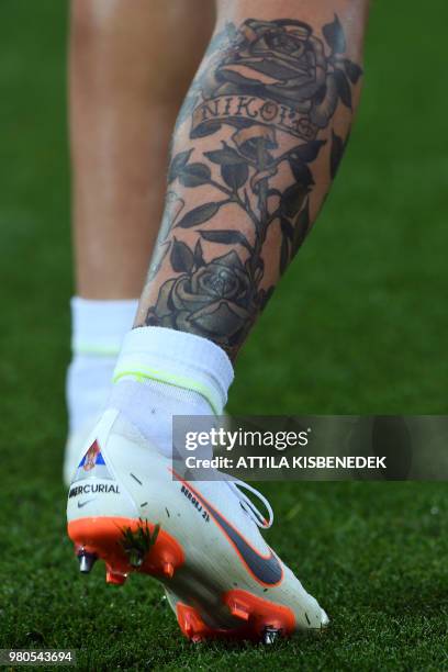 Picture shows a tattoo on Serbia's midfielder Sergej Milinkovic-Savic's leg during a training session at the Kaliningrad Stadium in Kaliningrad on...