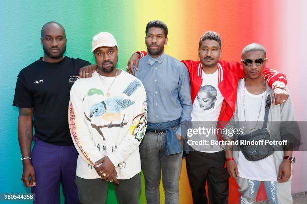 Stylist Virgil Abloh and Kanye West pose after the Louis Vuitton Menswear Spring/Summer 2019 show as part of Paris Fashion Week on June 21, 2018 in...
