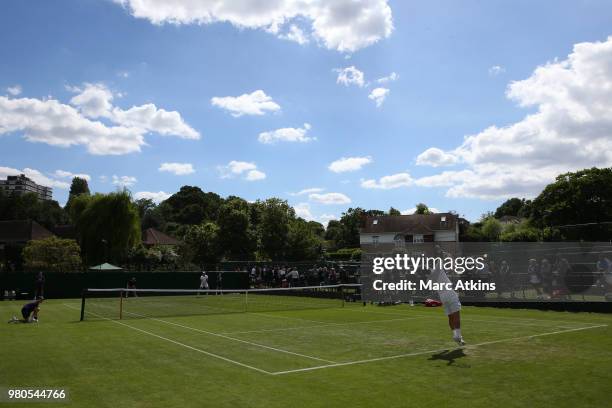 Dan Evans of Great Britain in action with Evan Hoyt of Wales during Wimbledon 2018 Pre-Qualifying at Southlands College Tennis Courts on June 21,...