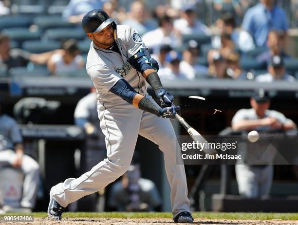 Nelson Cruz of the Seattle Mariners connects on a broken bat single in the sixth inning against the New York Yankees at Yankee Stadium on June 21,...