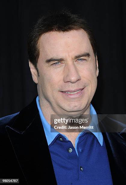 Actor John Travolta arrives at the "The Last Song" Los Angeles premiere held at ArcLight Hollywood on March 25, 2010 in Hollywood, California.