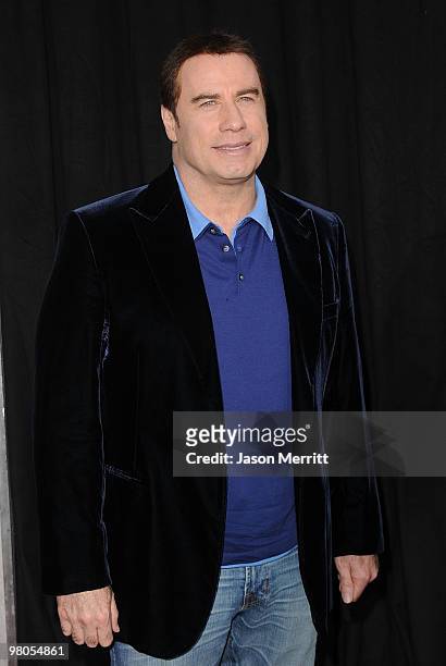 Actor John Travolta arrives at the "The Last Song" Los Angeles premiere held at ArcLight Hollywood on March 25, 2010 in Hollywood, California.