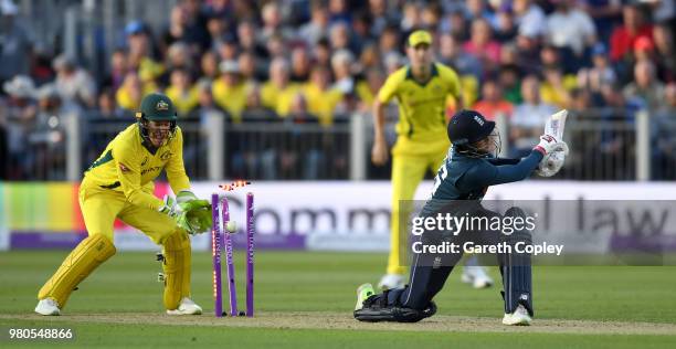 Joe Root of England is bowled by Ashton Agar of Australia during the 4th Royal London One Day International between England and Australia at Emirates...