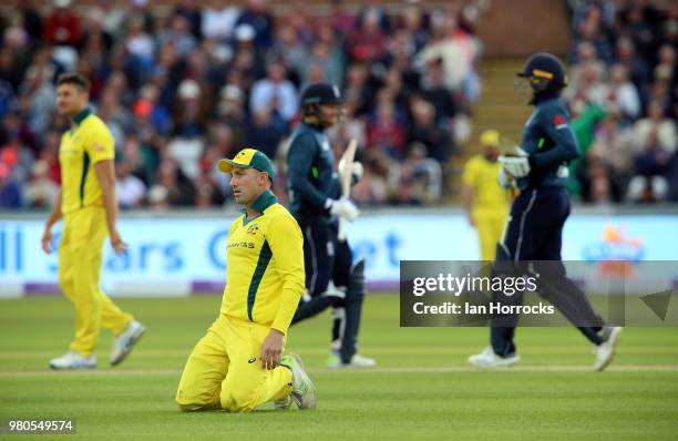 Shaun Marsh of Australia sinks to his knees as Bairstow and Roy of England make their way to a 174 partnership during the 4th Royal London ODI at...