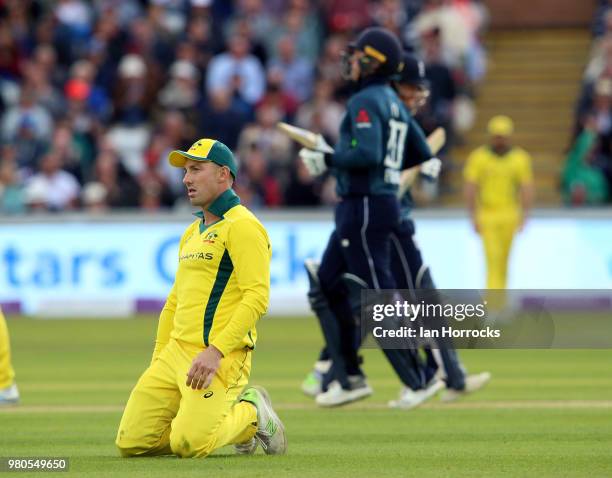 Shaun Marsh of Australia sinks to his knees as Bairstow and Roy of England make their way to a 174 partnership during the 4th Royal London ODI at...