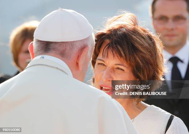 Pope Francis speaks with Swiss Federal Councilor Doris Leuthard before leaving at Cointrin airport in Geneva, on June 21 2018 after a one-day visit...