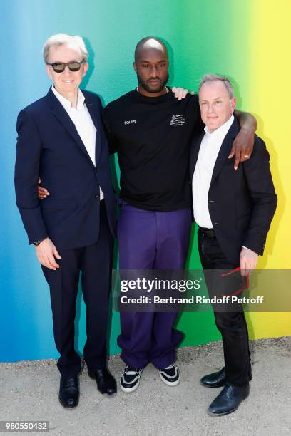 Owner of LVMH Luxury Group Bernard Arnault, Stylist Virgil Abloh and CEO of Louis Vuitton Michael Burke pose after the Louis Vuitton Menswear...