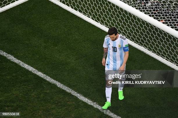 Argentina's forward Lionel Messi reacts during the Russia 2018 World Cup Group D football match between Argentina and Croatia at the Nizhny Novgorod...