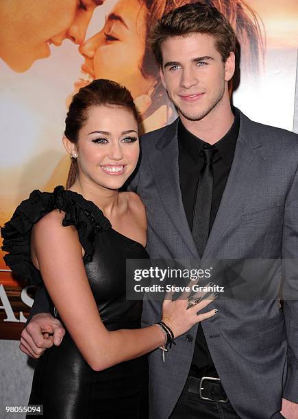 Miley Cyrus and Liam Hemsworth attends the "The Last Song" Los Angeles Premiere at ArcLight Hollywood on March 25, 2010 in Hollywood, California.