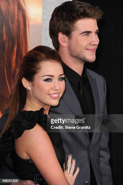 Miley Cyrus and Liam Hemsworth attends the "The Last Song" Los Angeles Premiere at ArcLight Hollywood on March 25, 2010 in Hollywood, California.