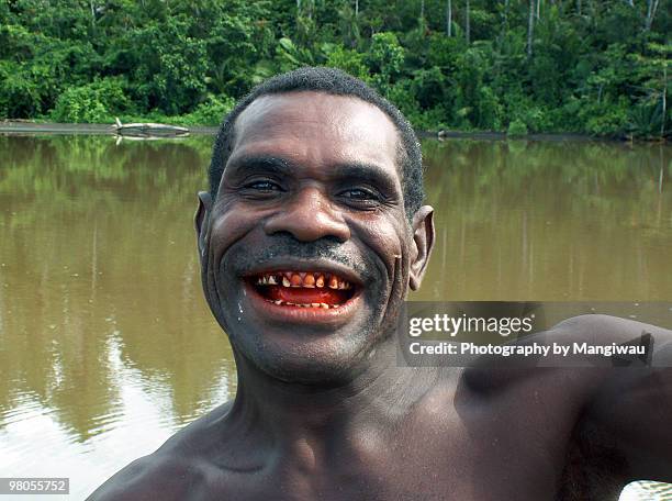 papuan man - areca stock pictures, royalty-free photos & images