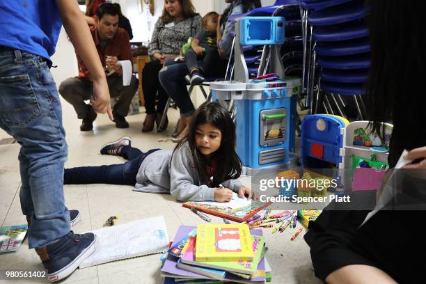 Recently arrived migrant families rest at the Catholic Charities Humanitarian Respite Center on June 21, 2018 in McAllen, Texas. Once families and...