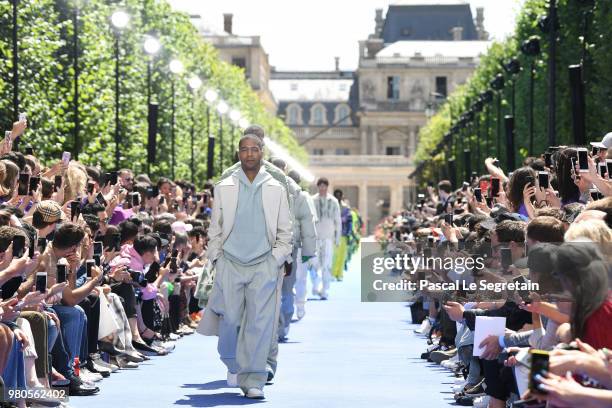 Kid Cudi walks the runway during the Louis Vuitton Menswear Spring/Summer 2019 show as part of Paris Fashion Week on June 21, 2018 in Paris, France.