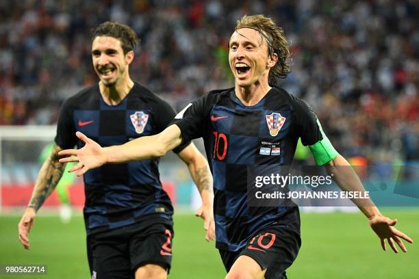 Croatia's midfielder Luka Modric celebrates after scoring their second goal during the Russia 2018 World Cup Group D football match between Argentina...