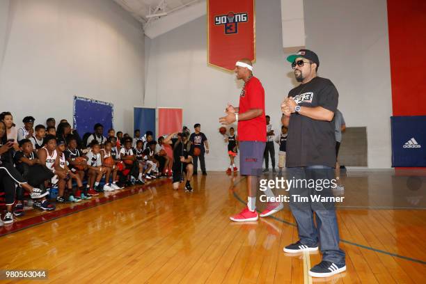 Rap Artist Ice Cube and Jerome Williams talk with participants during the Young3 Basketball Clinic and Tournament on June 21, 2018 in Houston, Texas.