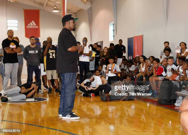 Rap Artist Ice Cube talks with participants during the Young3 Basketball Clinic and Tournament on June 21, 2018 in Houston, Texas.