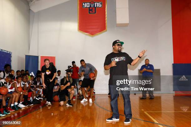 Rap Artist Ice Cube talks with participants during the Young3 Basketball Clinic and Tournament on June 21, 2018 in Houston, Texas.