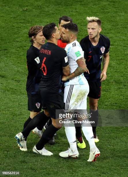 Dejan Lovren of Croatia confronts Nicolas Otamendi of Argentina, after Nicolas Otamendi of Argentina kicks a ball into Ivan Rakitic of Croatia during...