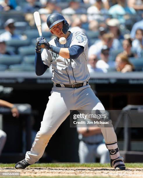 Ryon Healy of the Seattle Mariners is hit by a pitch in the fourth inning against the New York Yankees at Yankee Stadium on June 21, 2018 in the...