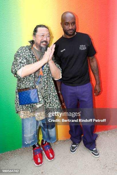 Artist Takashi Murakami and Stylist Virgil Abloh pose after the Louis Vuitton Menswear Spring/Summer 2019 show as part of Paris Fashion Week on June...