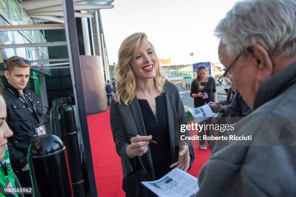 Scottish actress Shauna Macdonald signs autographs to fans during a photocall for the UK Premiere of 'White Chamber' during the 72nd Edinburgh...