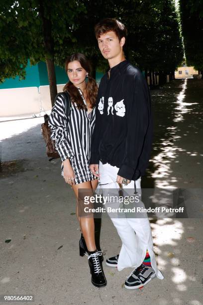 Actor Ansel Elgort and guest attend the Louis Vuitton Menswear Spring/Summer 2019 show as part of Paris Fashion Week on June 21, 2018 in Paris,...