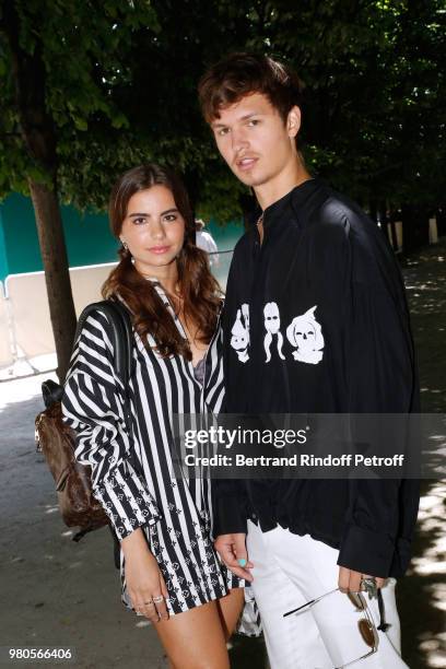 Actor Ansel Elgort and guest attend the Louis Vuitton Menswear Spring/Summer 2019 show as part of Paris Fashion Week on June 21, 2018 in Paris,...