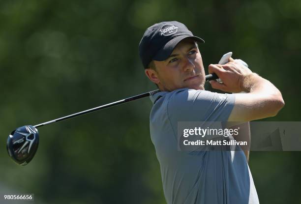 Jordan Spieth watches his tee shot on the seventh hole during the first round of the Travelers Championship at TPC River Highlands on June 21, 2018...