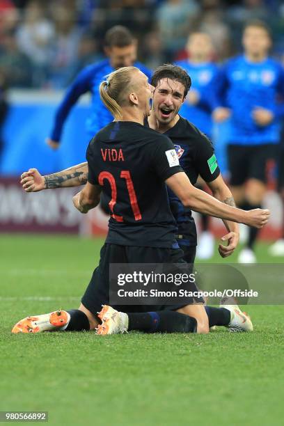 Domagoj Vida of Croatia and Sime Vrsaljko of Croatia celebrate their 3-0 win during the 2018 FIFA World Cup Russia Group D match between Argentina...