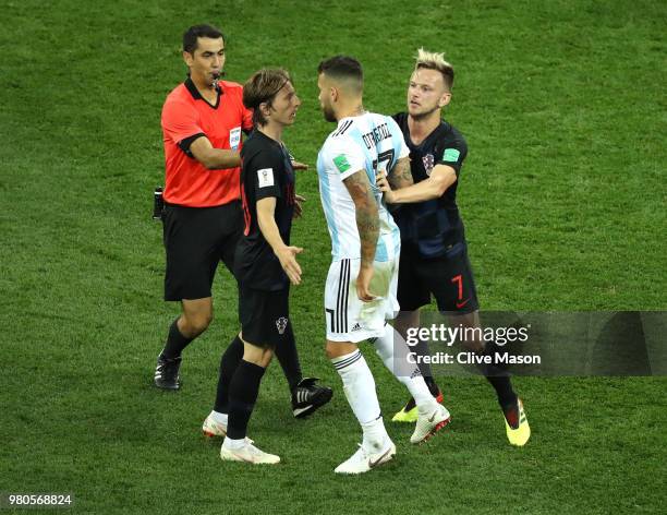 Nicolas Otamendi of Argentina argues with Luka Modric and Ivan Rakitic of Croatia during the 2018 FIFA World Cup Russia group D match between...