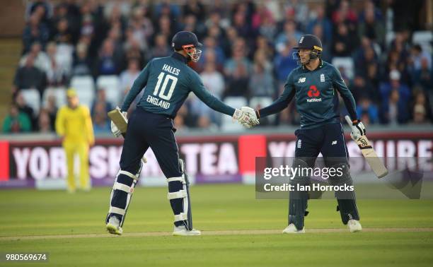 Jos Buttler and Alex Hales of England celebrate closing out the win during the 4th Royal London ODI at Emirates Durham ICG on June 21, 2018 in...