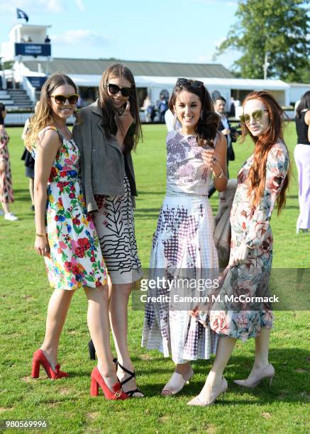 Amber Le Bon, Sabrina Percy, Rosanna Falconer and Olivia Grant step in the divots at the Laureus Polo Cup the at Ham Polo Club on June 21, 2018 in...
