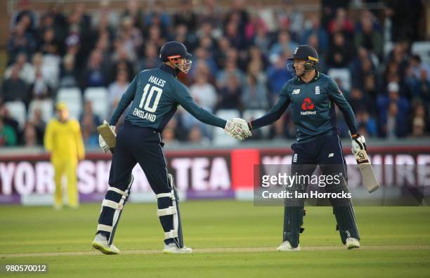 Jos Buttler and Alex Hales of England celebrate closing out the win during the 4th Royal London ODI at Emirates Durham ICG on June 21, 2018 in...