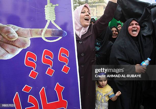 Supporters of Iraq's Prime Minister Nuri al-Maliki shout slogans during a protest in Baghdad on March 26, 2010 to demand recount of the votes ahead...