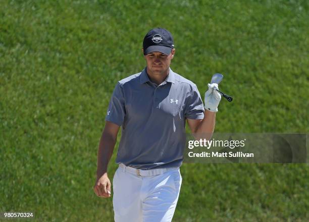 Jordan Spieth pumps his fist after making an eagle during the first round of the Travelers Championship at TPC River Highlands on June 21, 2018 in...