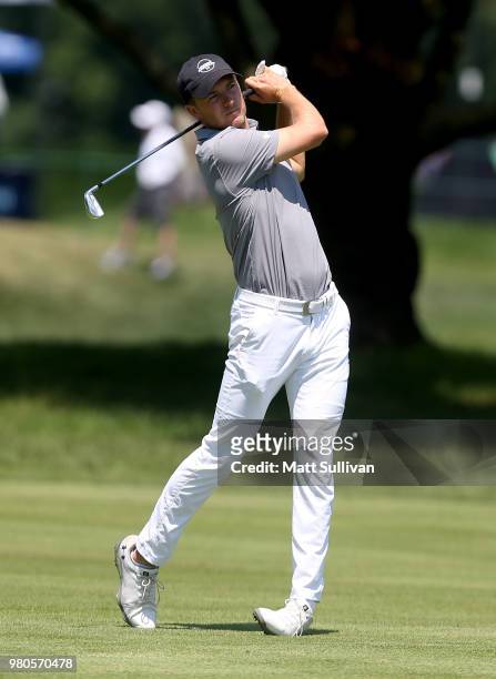 Jordan Spieth hits his second shot on the sixth hole during the first round of the Travelers Championship at TPC River Highlands on June 21, 2018 in...