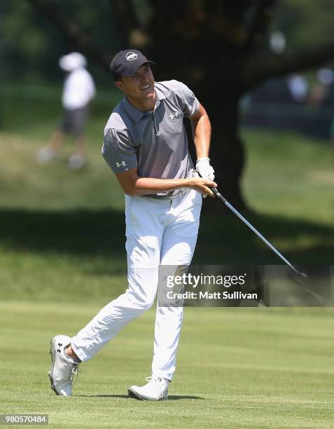 Jordan Spieth hits his second shot on the sixth hole during the first round of the Travelers Championship at TPC River Highlands on June 21, 2018 in...