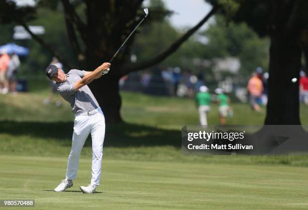 Jordan Spieth hits his second shot on the sixth hole during the first round of the Travelers Championship at TPC River Highlands on June 21, 2018 in...