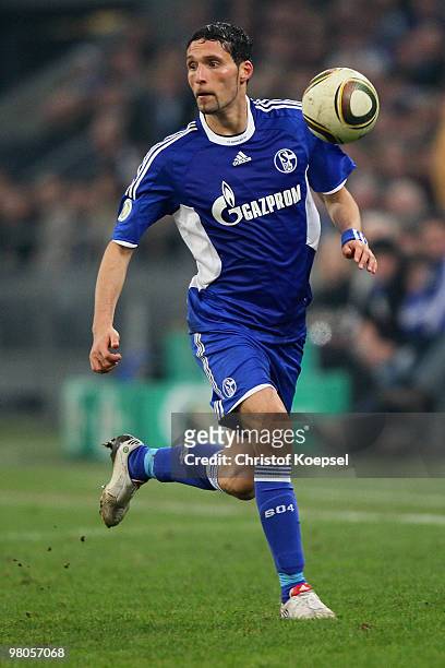 Kevin Kuranyi of Schalke runs with the ball during the DFB Cup semi final match between FC Schalke 04 and FC Bayern Muenchen at Veltins Arena on...