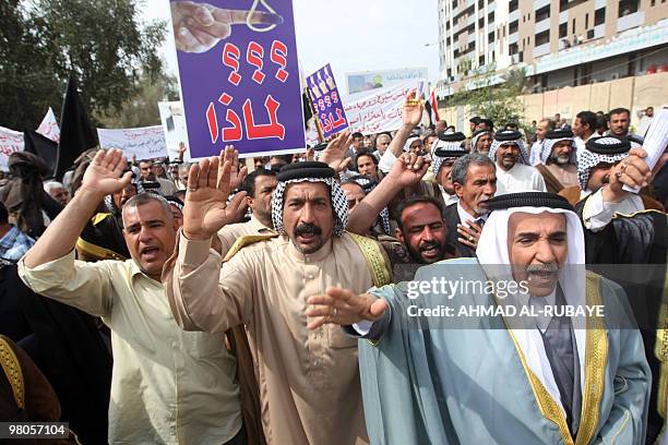 Supporters of Iraq's Prime Minister Nuri al-Maliki shout slogans during a protest in Baghdad on March 26, 2010 to demand recount of the votes ahead...